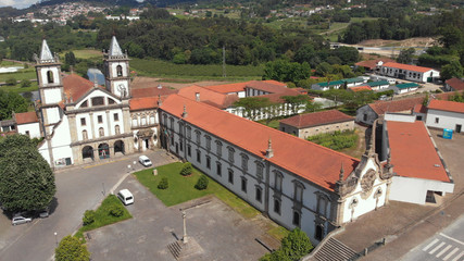 Aerial view of the Monastery of St. Benedict (Sao Bento) in the city of Santo Tirso, Portugal, with the Ave River in the background. Benedictine order.