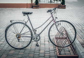 Fototapeta na wymiar Retro styled sepia image of a vintage bicycle