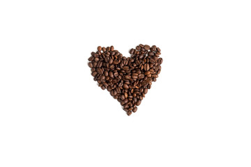 heart of cofee grains on white wooden background