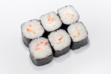 Japanese roll with rice, nori and with natural crab meat on a white background