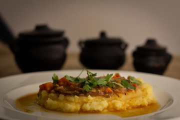 smashed potato with souce of ground beef