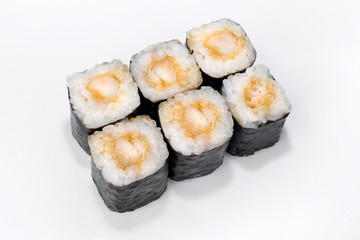 Japanese traditional roll with nori, rice, fried perch with teriyaki sauce on a white plate