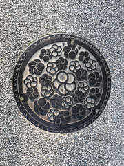 Manhole cover in Dazaifu Tenmangu in Fukuoka, Japan