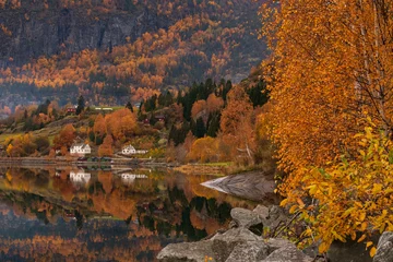 Fotobehang Chocoladebruin Norwegian fjord landscape with beautiful water reflection in autumn  © Lars Gieger