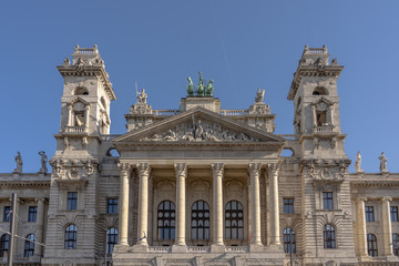 Fototapeta na wymiar Neo Renaissance main facade with court trial sculptures on tympanum field of Museum of Ethnography in Budapest