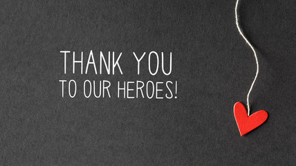 Thank You to Our Heroes message with handmade small paper hearts