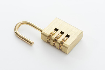Unlocked Golden Padlock on the white background.