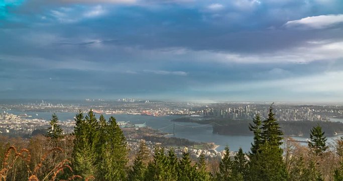Evening cityscape time lapse of Vancouver B.C., Canada. View from the road up to Cypress Mountain. Includes 2 versions - one stationary and one with a pan using the full resolution of the image.
