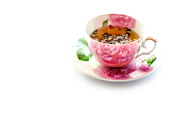 Cup of tea. Large tea leaves in a Cup. Large-leaf tea with fruit. Tea party.