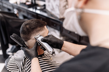 Men's beauty salon. Men's haircut in a barbershop. 