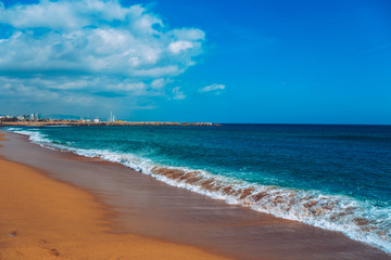 Fototapeta na wymiar sea and beach and sky in barcelona