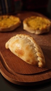 An Empanada - A Dish Of South American Cuisine - Baked