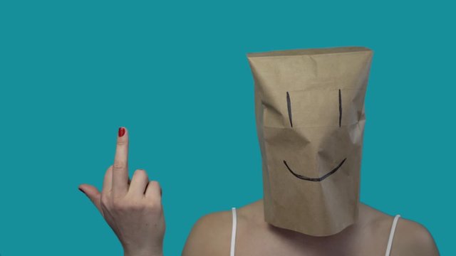 Emotions and gestures. With smile, man shows fack. Drawn on box. Blue background