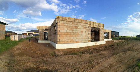 Panorama of house under construction in construction site