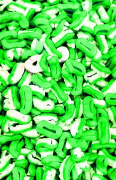 many sugar jelly candies as many green white teets