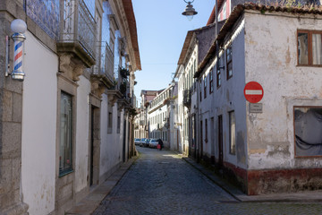 Located on the Cávado River’s left bank, the typical village of Fao is characterized by a marked neighborhood spirit. The narrow Azevedo Coutinho Street, Fao, Esposende, Portugal.
