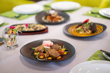 many different dishes arranged on the table view of the chef in a restaurant