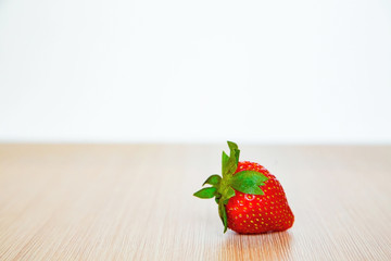 strawberry berries, red and ripe, on a light background, with space for copying,and space for text