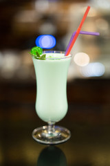 close up of a beautiful photo of a cocktail prepared by a bartender at the bar