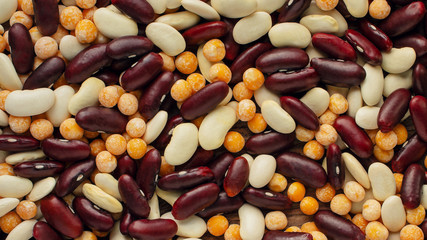 Red and white kidney beans with dried yellow peas food background