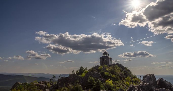 Mount Carleton Provincial Park New Brunswick Canada. Time lapse View of the old fire watch tower at the peak of Mount Carleton. Includes both a still version and a zoom out version.
