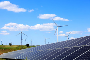 Solar photovoltaic panels and wind turbines.