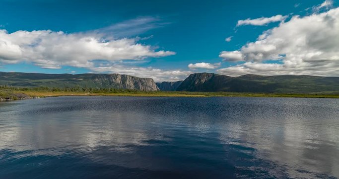 Gros Morne National Park, Newfoundland, Canada. Time lapse of western brook pond mountains in the background with Jerry's Pond in the Foreground.