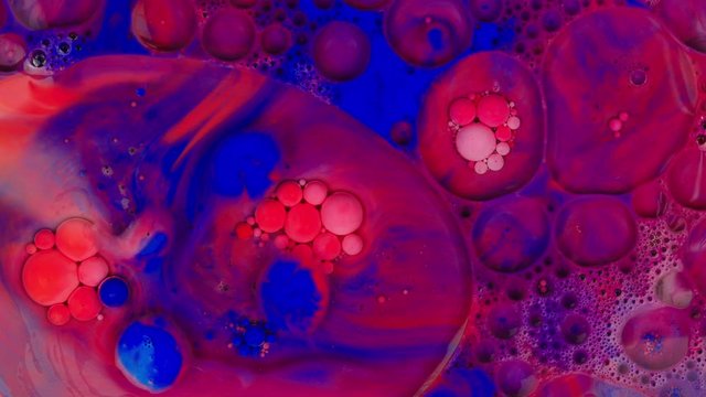 Multicolored acrylic paint. Fantastic surface. Abstract colorful paint. Top view