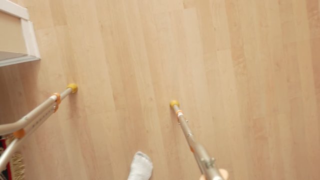 Injured man's POV while using crutches,struggling  to walk around in his house