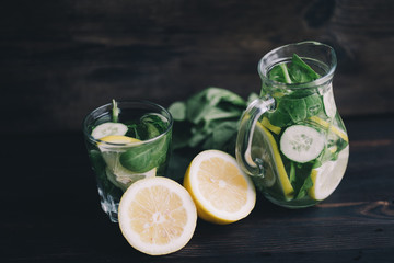 Detox drink. Infused water with lemon and cucumber. Green lemonade, summer refreshing beverage