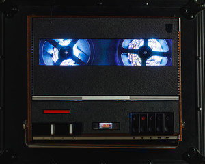 reel to reel audio tape recorder with blue led light strip
