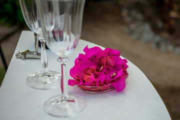 White table for a wedding ceremony with decorations on the seashore.