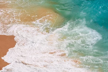 Poster Raging ocean, azure coast with a golden sandy beach. Top view, drone view Benagil Beach in Portugal. © SValeriia