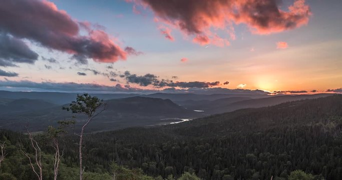 Gros Morne National Park, Newfoundland, Canada. Sunset Time lapse from the highest highway viewpoint in the park. Includes 2 versions - 1 stationary and 1 with a digital tilt up using full res of img.