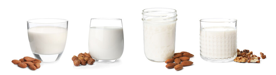 Set with different types of organic milk and nuts on white background. Banner design