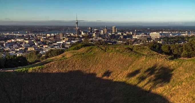 Auckland, New Zealand. Evening Time lapse on the top of Maungarei/Mount Wellington overlooking the city. Includes 2 versions - 1 stationary, 1 digital zoom out using the full image resolution.