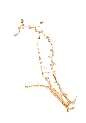 Abstract splash of expensive whiskey on white background