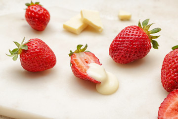 Board with tasty strawberry and chocolate, closeup