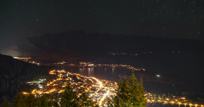 Night time-lapse in Queenstown New Zealand. View from top of skyline gondola. Includes 2 versions, 1 stationary and 1 digital tilt up using full image resolution.