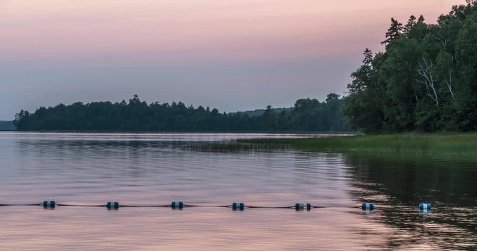 Restoule Provincial Park, Ontario, Canada. Sunset time lapse over Restoule lake. Includes 2 versions - a stationary version and a digital zoom out using the full image resolution.