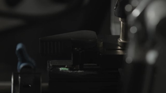 Scientist flips switch on science fiction contraption device invention gun technology
