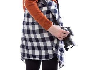 Close up view of unbranded lens and camera carried by a self-employed female gig photographer or...