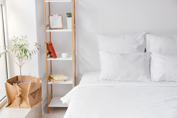 Interior of comfortable modern bedroom