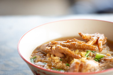Hot chicken noodle in white bowl, Street food of Thailand.