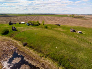 aerial views of old farm houses, barns and other buildings that were built by some of the earliest farming settlers of the Saskatchewan Prairies. These buildings date back to the early 1900's