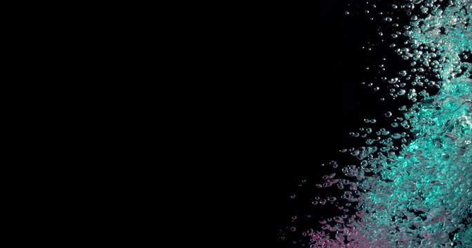 blue bubbles rising up from the bottom and going up along the right side of the frame.