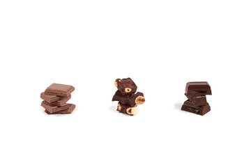 Collection of various dark chocolate pieces isolated on white background