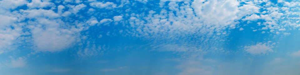 Panorama sky with beautiful cloud on a sunny day. Panoramic high resolution image.