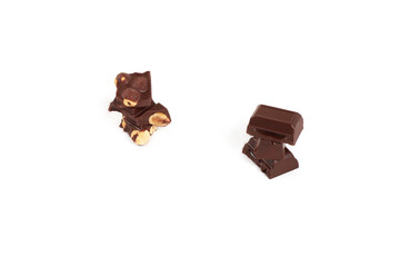 Collection of various dark chocolate pieces isolated on white background