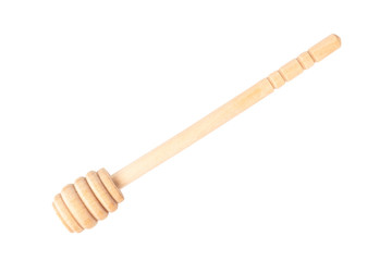 wooden honey spoon isolated on white background